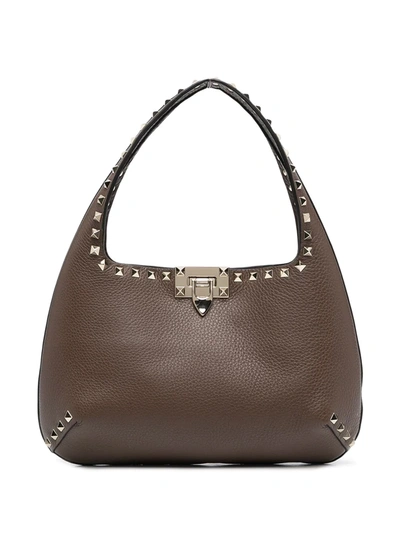 Shop Valentino Small Rockstud Hobo Bag In Brown