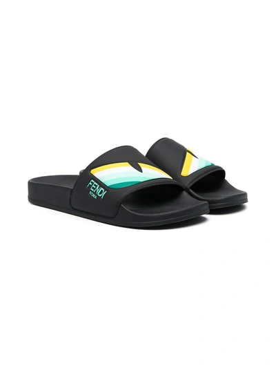 Shop Fendi Teen Eye Slide Sandals In Black