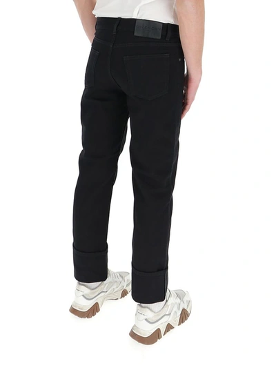 Shop Givenchy Logo Patch Jeans In Black