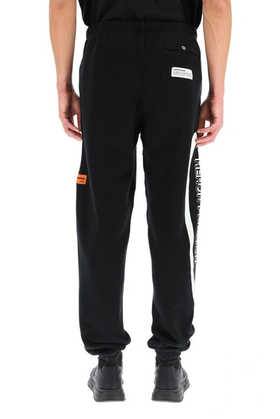 Shop Heron Preston Logo Print Track Pants In Black