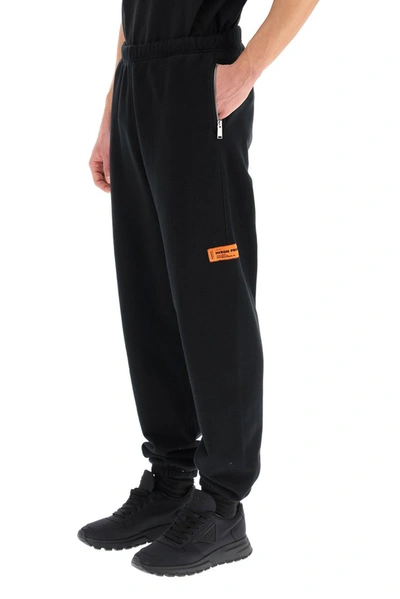 Shop Heron Preston Logo Print Track Pants In Black