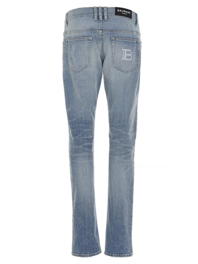 Shop Balmain Slim Leg Ripped Jeans In Blue
