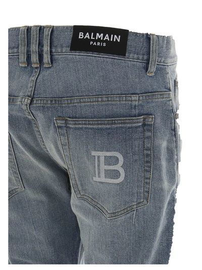 Shop Balmain Slim Leg Ripped Jeans In Blue