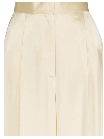 Shop Loewe Fluid Trousers In Beige