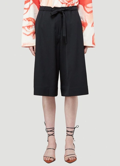 Shop Jw Anderson Wide Leg Shorts In Black