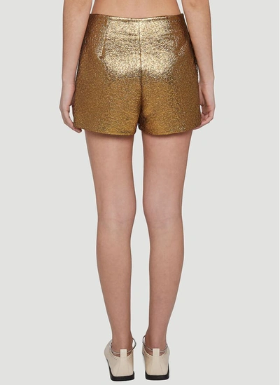 Shop Valentino Metallic Shorts In Gold