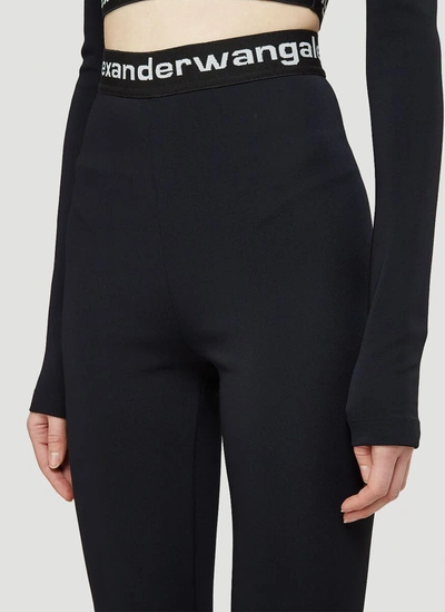 Shop Alexander Wang Flared Logo Pants In Black