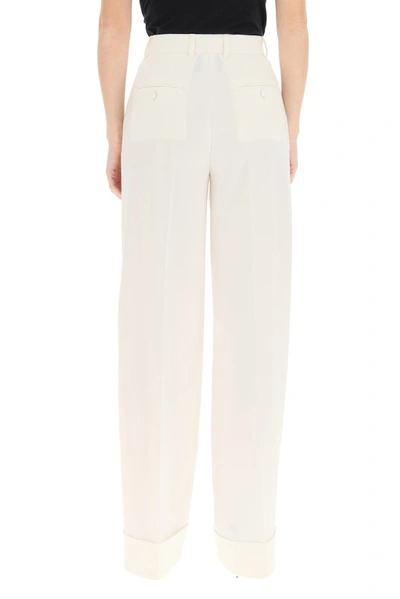 Shop Dolce & Gabbana Basketweave Palazzo Pants In White