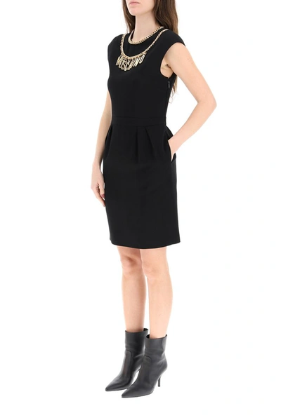 Shop Moschino Logo Chain Neckline Dress In Black