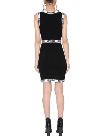 Shop Moschino Logo Tape Knitted Dress In Black