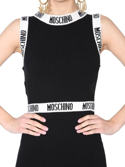 Shop Moschino Logo Tape Knitted Dress In Black