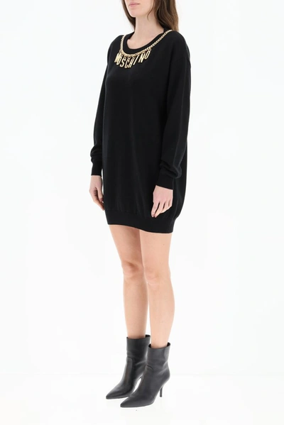 Shop Moschino Logo Chain Neckline Sweater Dress In Black