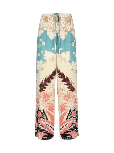 Shop Valentino Printed Drawstring Trousers In Multi