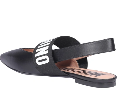 Shop Moschino Logo Slingback Flats In Black