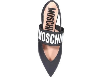 Shop Moschino Logo Slingback Flats In Black