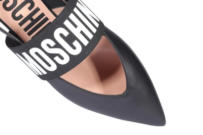 Shop Moschino Logo Slingback Flats In Black