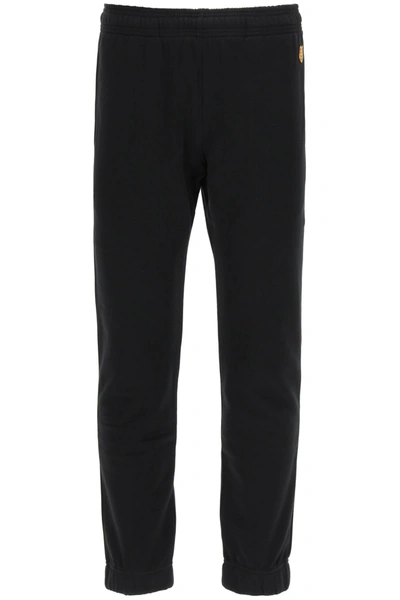 Shop Kenzo Jogger Pants Tiger Patch In Black (black)