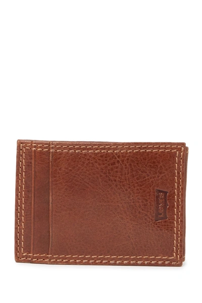 Shop Levi's Magnetic Rfid Bifold Wallet In Tan