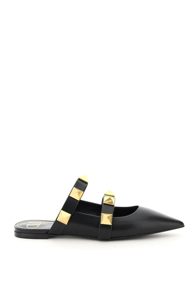 Shop Valentino Garavani Roman Stud Flat Mules In Black