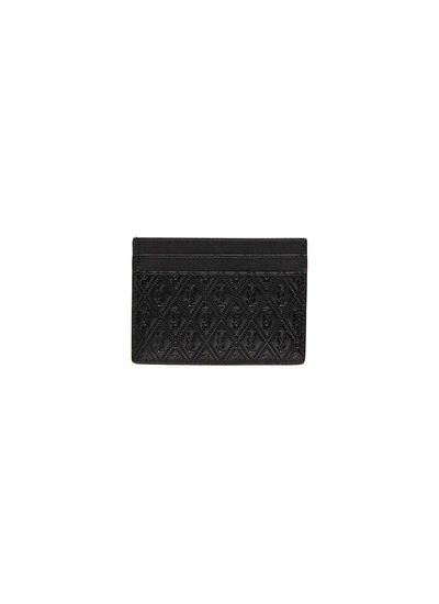 Shop Saint Laurent Monogram Embossed Leather Cardholder