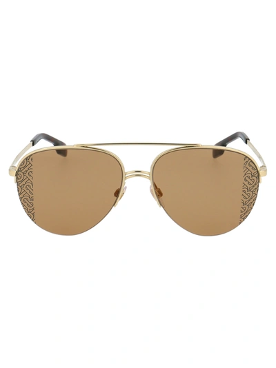 Shop Burberry Ferry Sunglasses In 110993 Light Gold