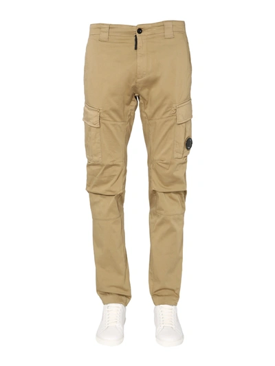 Shop C.p. Company Cargo Pants With Iconic Lens In Beige