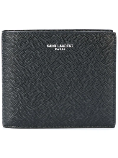 Shop Saint Laurent East West Leather Wallet In Black