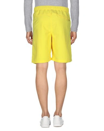 Shop The North Face Man Shorts & Bermuda Shorts Yellow Size L Polyester