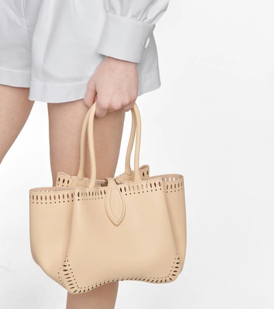 Shop Alaïa Angele 20 Mini Leather Tote In Beige