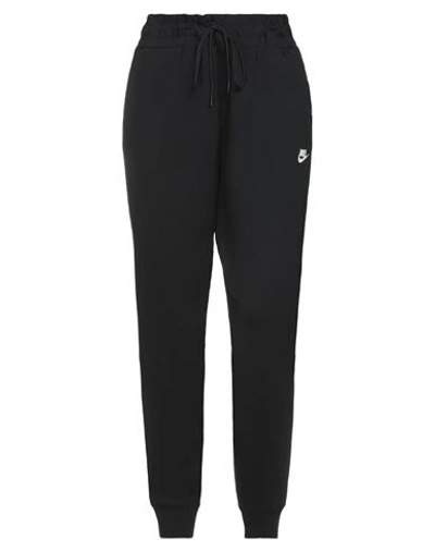 Shop Nike Pants In Black
