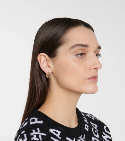 Shop Balenciaga Loop Xxs Earrings In Gold