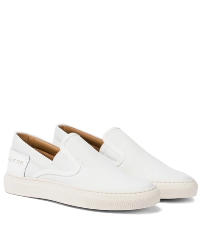 Shop Common Projects Slip On Canvas Sneakers In White