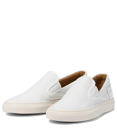 Shop Common Projects Slip On Canvas Sneakers In White
