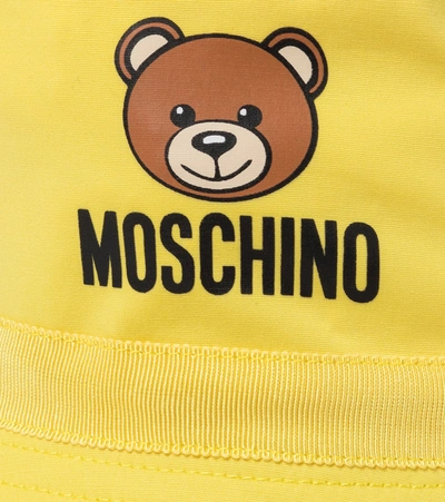 Shop Moschino Baby Stretch-cotton Bucket Hat In Yellow