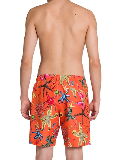 Shop Versace Men's Trésor De La Mer Swim Trunks In Orange Multicolor