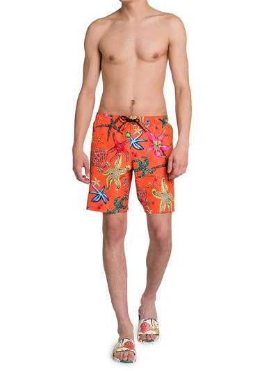 Shop Versace Men's Trésor De La Mer Swim Trunks In Orange Multicolor