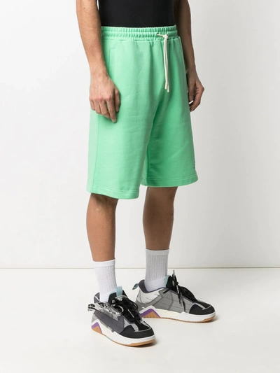 Shop Msgm Logo-print Shorts In Green