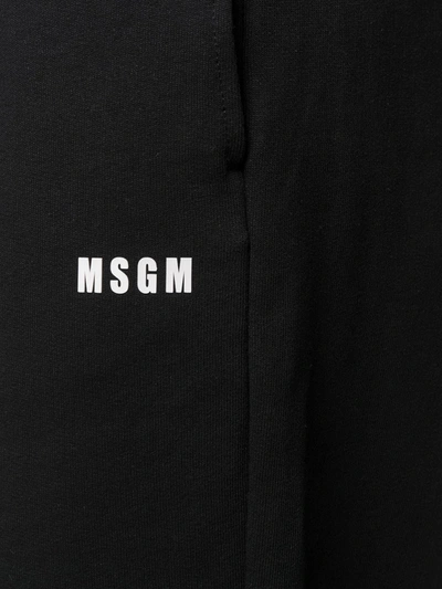 Shop Msgm Logo-print Tapered Track Pants In Black