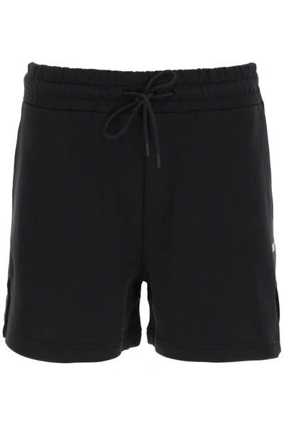 Shop Msgm Shorts With Micro Logo Print In Black (black)