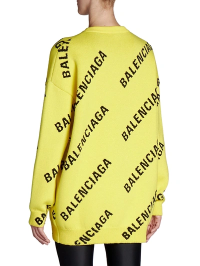 Shop Balenciaga Allover Logo Crewneck Sweater In Yellow Black