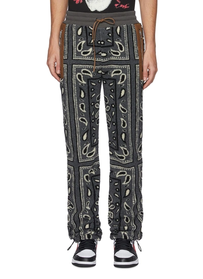 Shop Amiri Bandana Print Fleece Jogger Pants