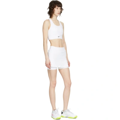 Shop Nike White Swoosh Long Line Sports Bra In 100 White/b