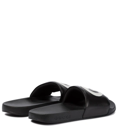 Shop Gucci Pursuit Gg Leather Slides In Black