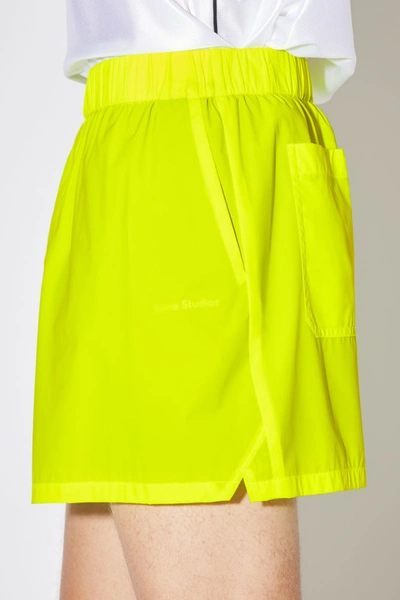 Shop Acne Studios Neon Shorts Neon Yellow