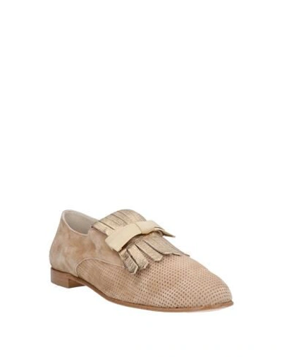 Shop Status Loafers In Camel