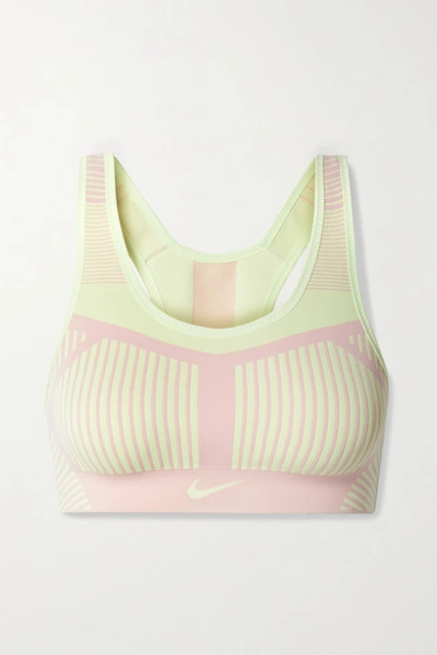 Shop Nike Fe/nom Striped Flyknit Sports Bra In Pastel Pink