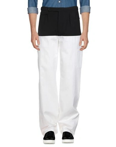 Shop Raf Simons Pants In White