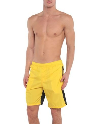 Shop Givenchy Swim Trunks In Yellow