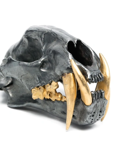 Parts Of Four Leopard Skull Decorative Object In Silver