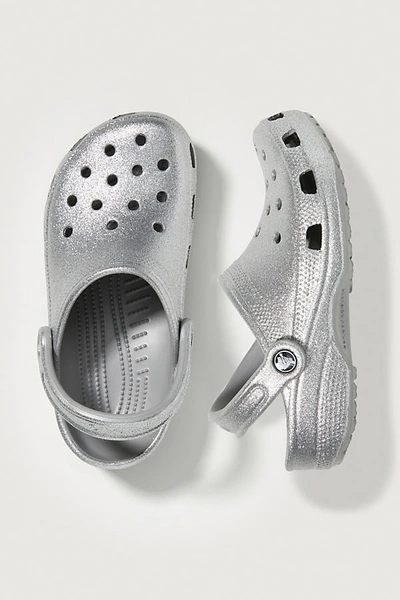 Shop Crocs Classic Glitter Clogs In Silver